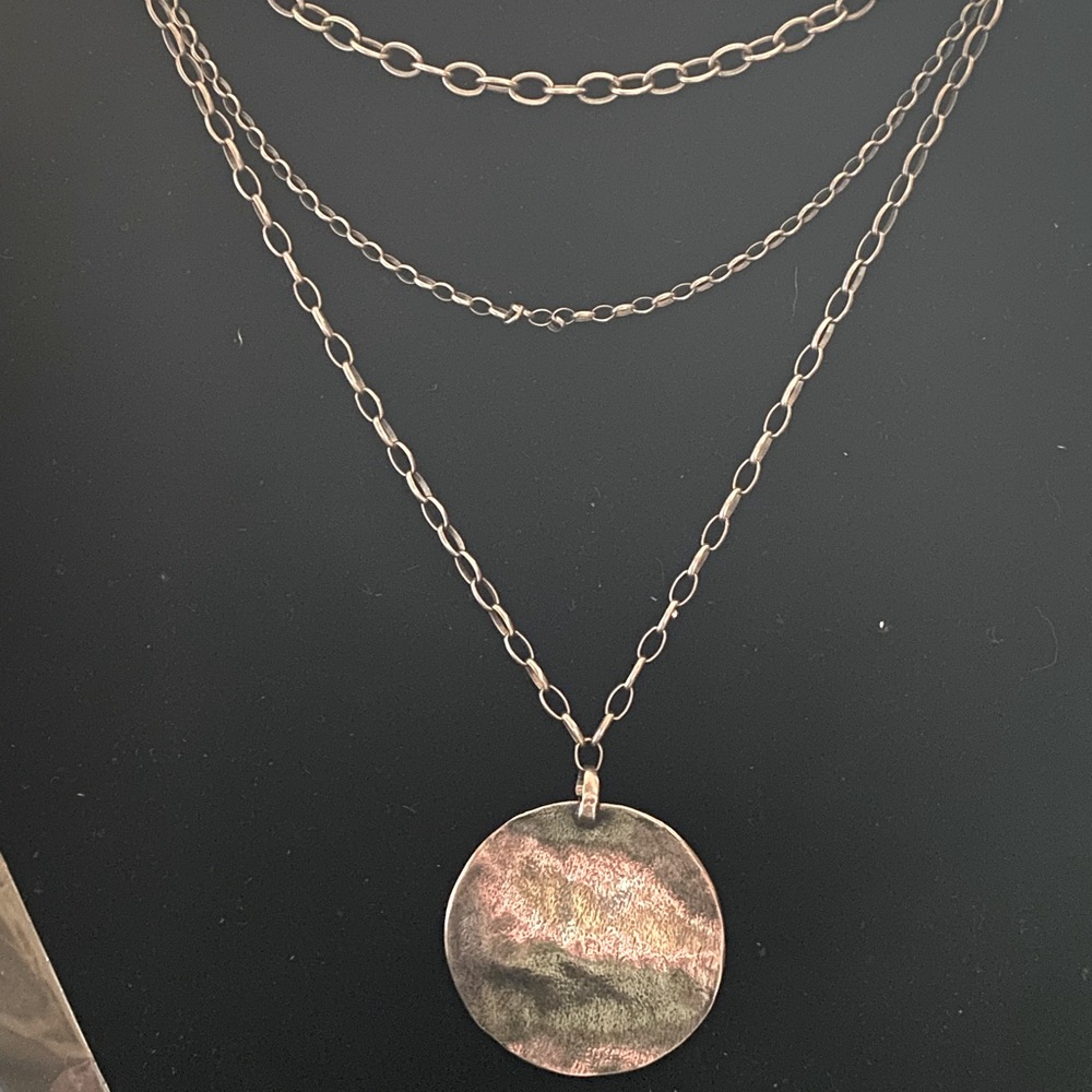 Silpada layers necklace with large oxidized pendant.